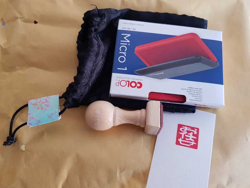 sello hanko manual con tinta y bolsita.